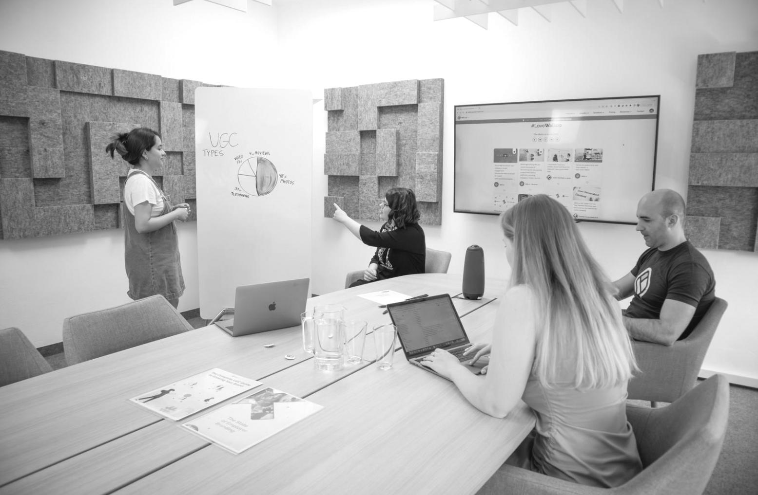 Team collaboration session analyzing business performance metrics and market data